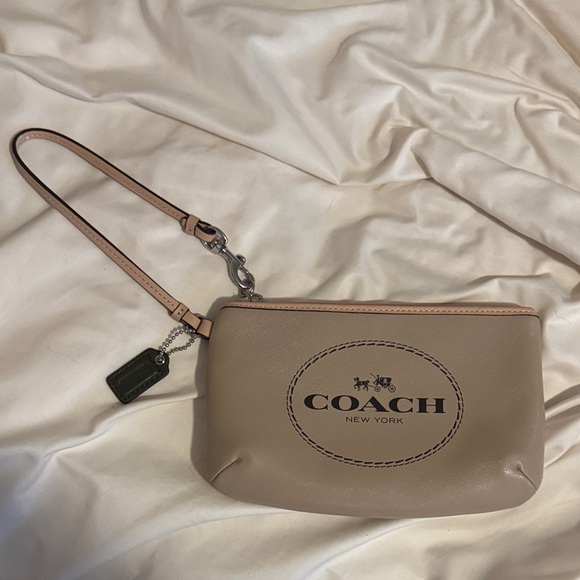 Coach Handbags - Coach Beige Wristlet with Logo